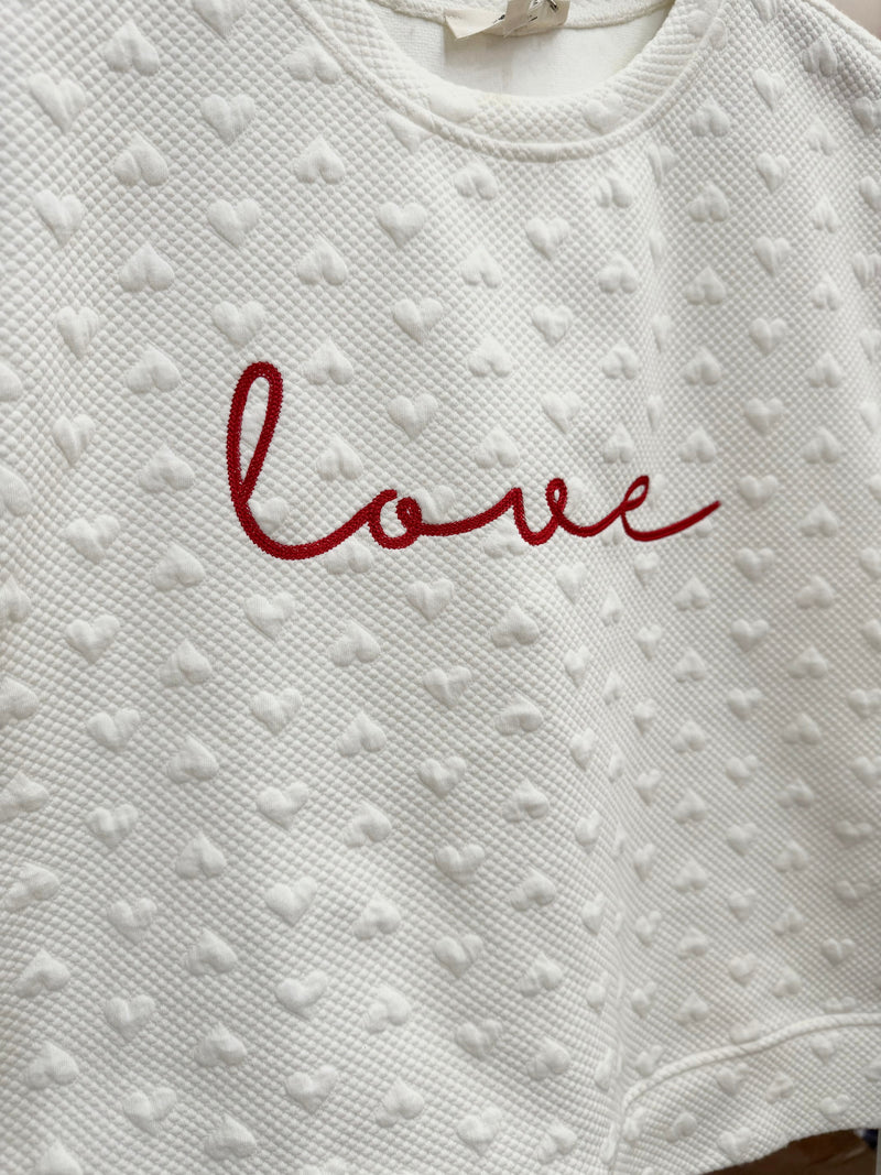 White “LOVE” Heart Textured Top - Peplum Clothing